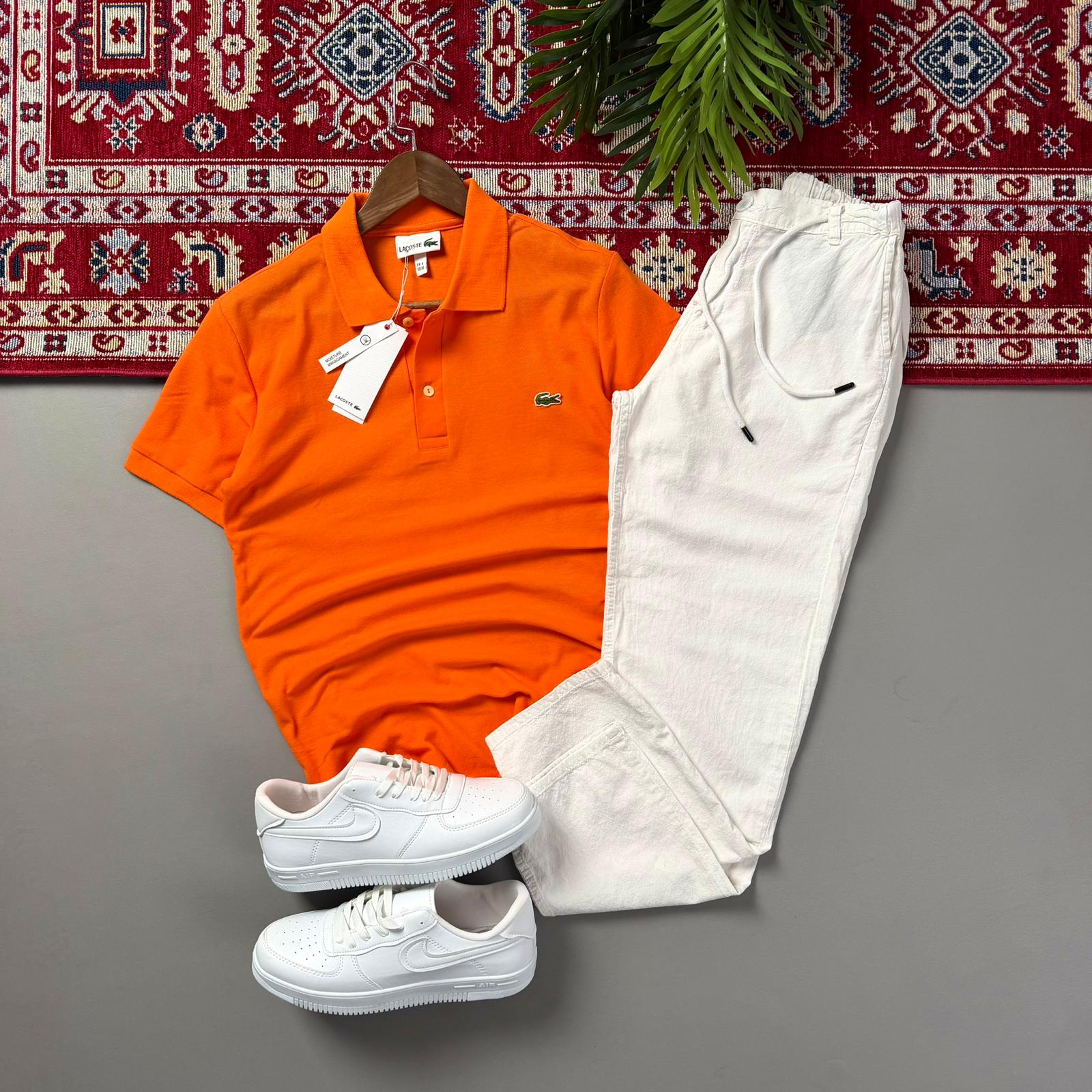 Turuncu Lacoste Polo Yaka Beyaz Keten Pantolonlu Kombin
