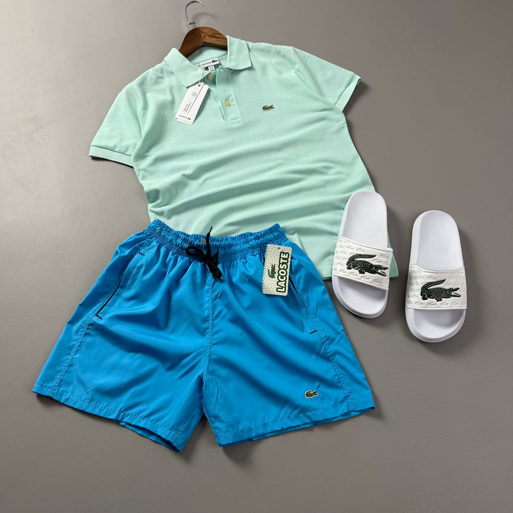 Lacoste Erkek Mint Yeşili & Turkuaz Yazlık Kombin Seti – Polo Tişört, Deniz Şortu ve Terlik